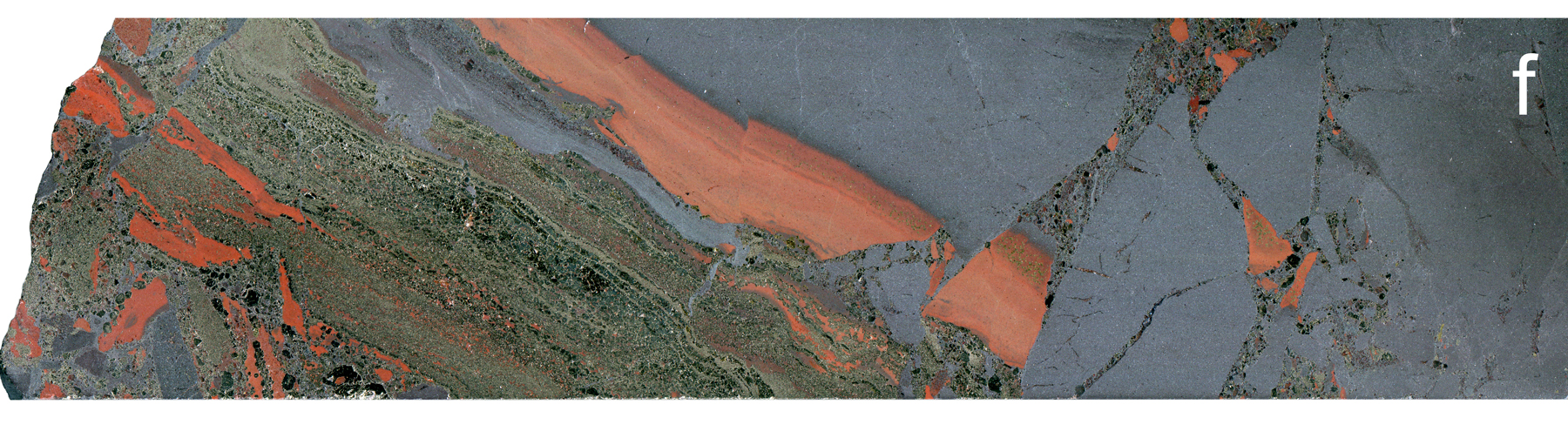 Laminated, hematite-sulphide altered brecciated sediments