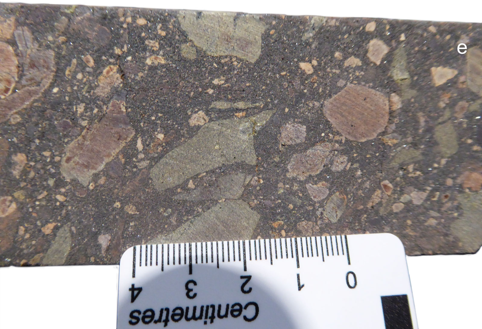 Prominent Hill heterolithic breccia with steely hematite altered matrix