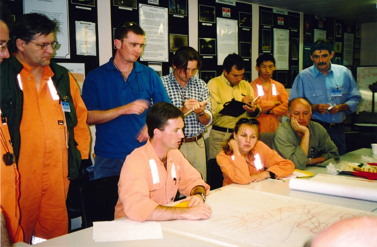 [Studying drill sections, Olympic Dam, SA]